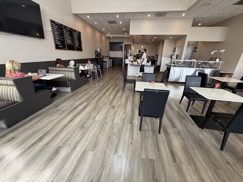 Inside Blvd Coffee — light-filled café space with modern furnishings